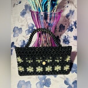 Stylish Black Beaded Clutch with Floral Design